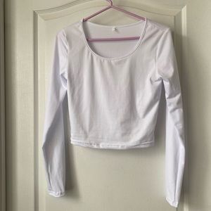 Slim fit white crop top. Size small. Never worn